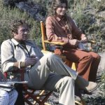 Michael Caine and Katharine Ross on the sidelines during the filming of THE SWARM on location in 1977.