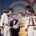 1975 – Princess Anne with members of the Bay City Rollers at the Carl Alan Awards held at the Lyceum Ballroom, London