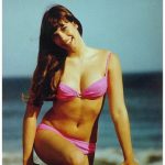 Barbi Benton in a pink bikini