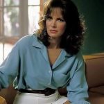 Jaclyn Smith working in a mini skirt