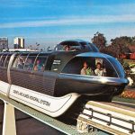 Monorail green with the Disneyland Hotel station in the background, heading for the Happiest Place on Earth, Disneyland! From a 1973 Vacationland cover.