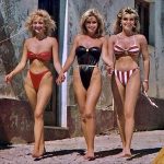 Having fun with friends at the beach in the 1970s.