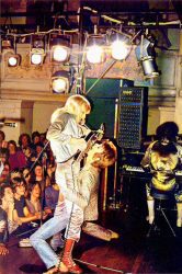 David Bowie and Mick Ronson, 1972 “Guitar Fellatio” David-Bowie-and-Mick-Ronson-1972..